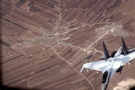A Russian fighter jet fired flares at a US drone over Syria and damaged it, the US military says